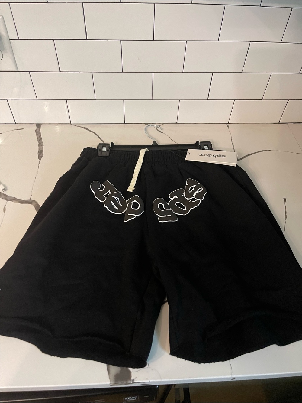 Men’s Graphic Design Shorts Size XL.